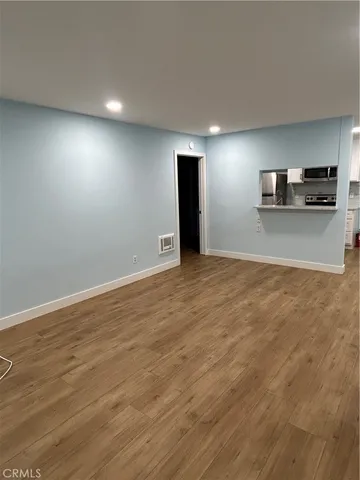 a view of a livingroom with a furniture