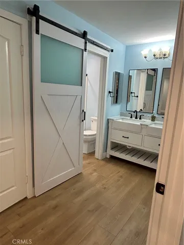 a view of room with closet and windows