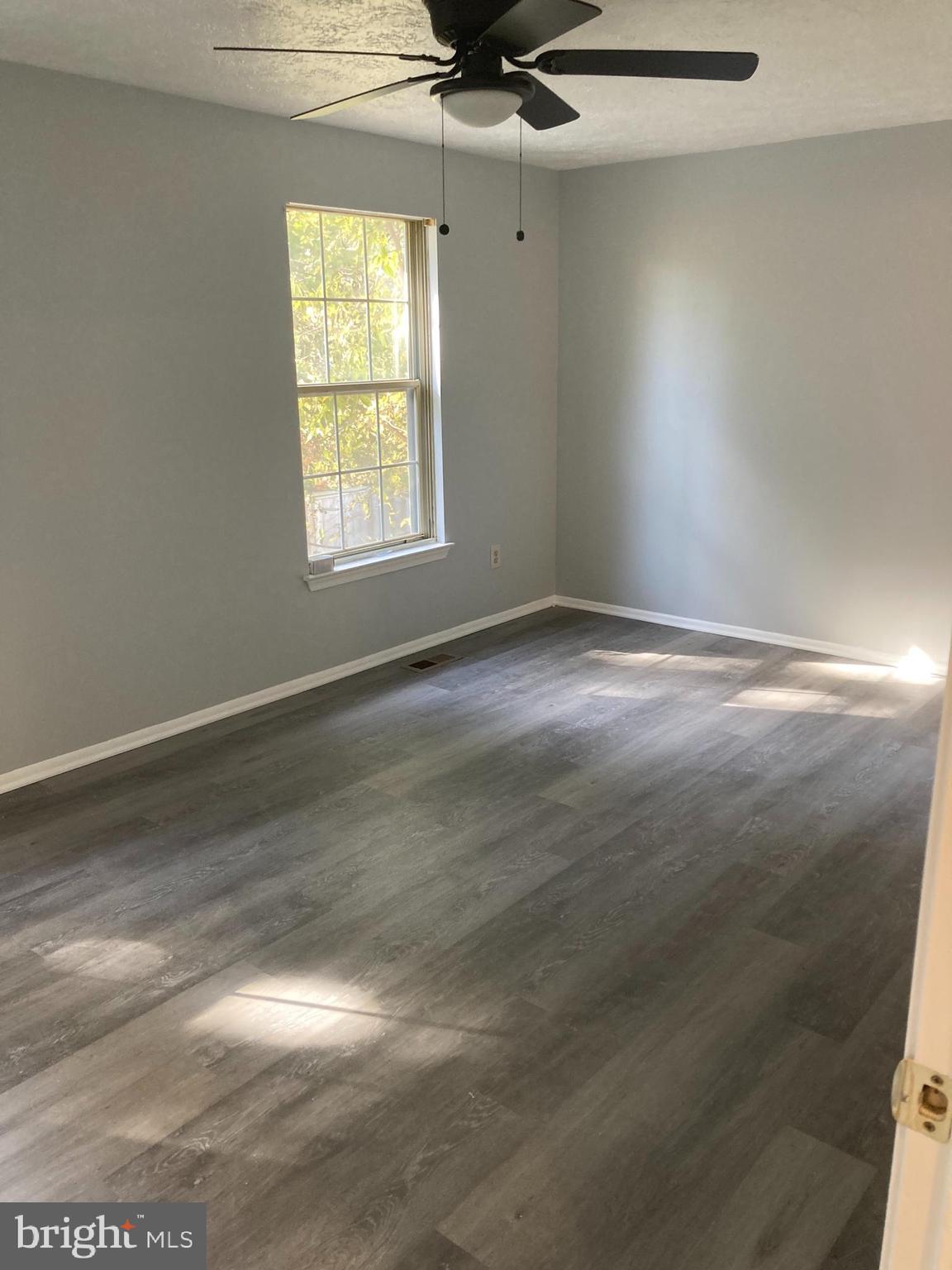 5012 Marlborough Terrace Upper Marlboro, MD 20772 - Photo 3 of 6 a view of an empty room and a window
