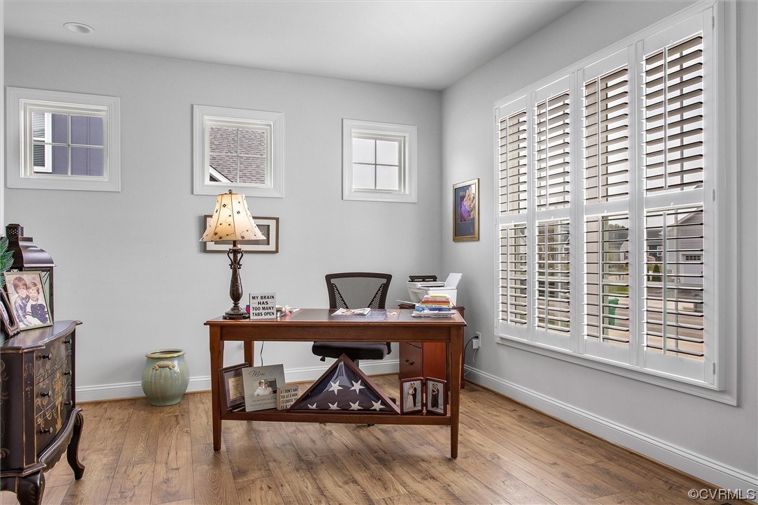 119 Evington Lane Ashland, VA 23005 - Photo 8 of 18 a view of a workspace with furniture and a window