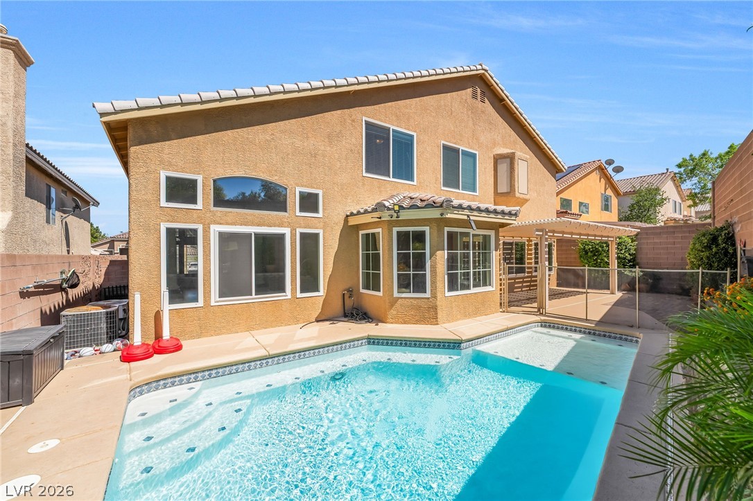 271 Pointe Ranier Avenue Henderson, NV 89012 - Photo 25 of 26 This private oasis features a sparkling pool and ample outdoor space for relaxation and entertaining.