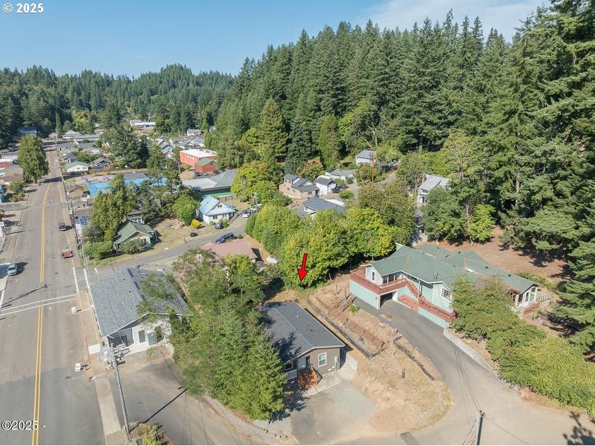150 Northwest 5th Street Toledo, OR 97391 - Photo 22 of 26 an aerial view of a house with a yard