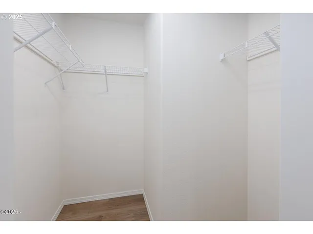 a view of an empty walk in closet