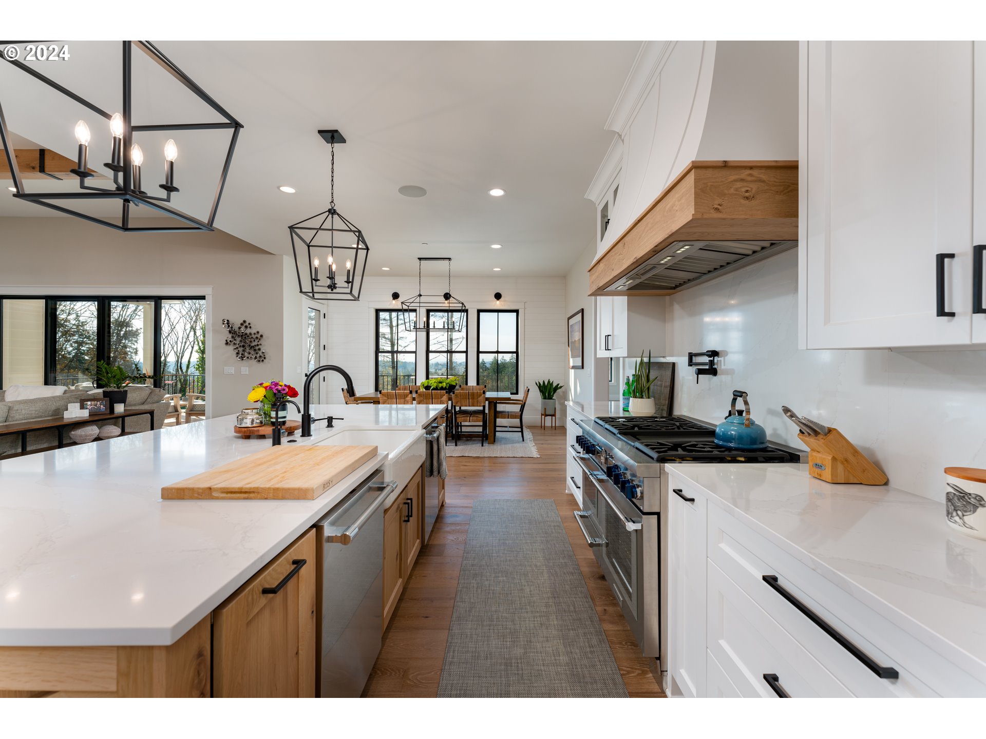0 Northeast Old Parrett Mountain Road Newberg, OR 97132 - Photo 17 of 48 a kitchen with stainless steel appliances granite countertop a sink a stove and a wooden floors