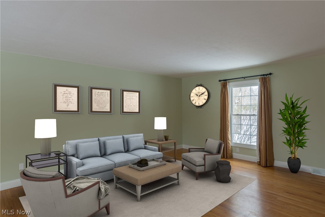 7447 Valley View Road Hudson, OH 44236 - Photo 3 of 30 Hardwood floors make this 25x14 formal or INFORMAL living room the perfect space to be creative
