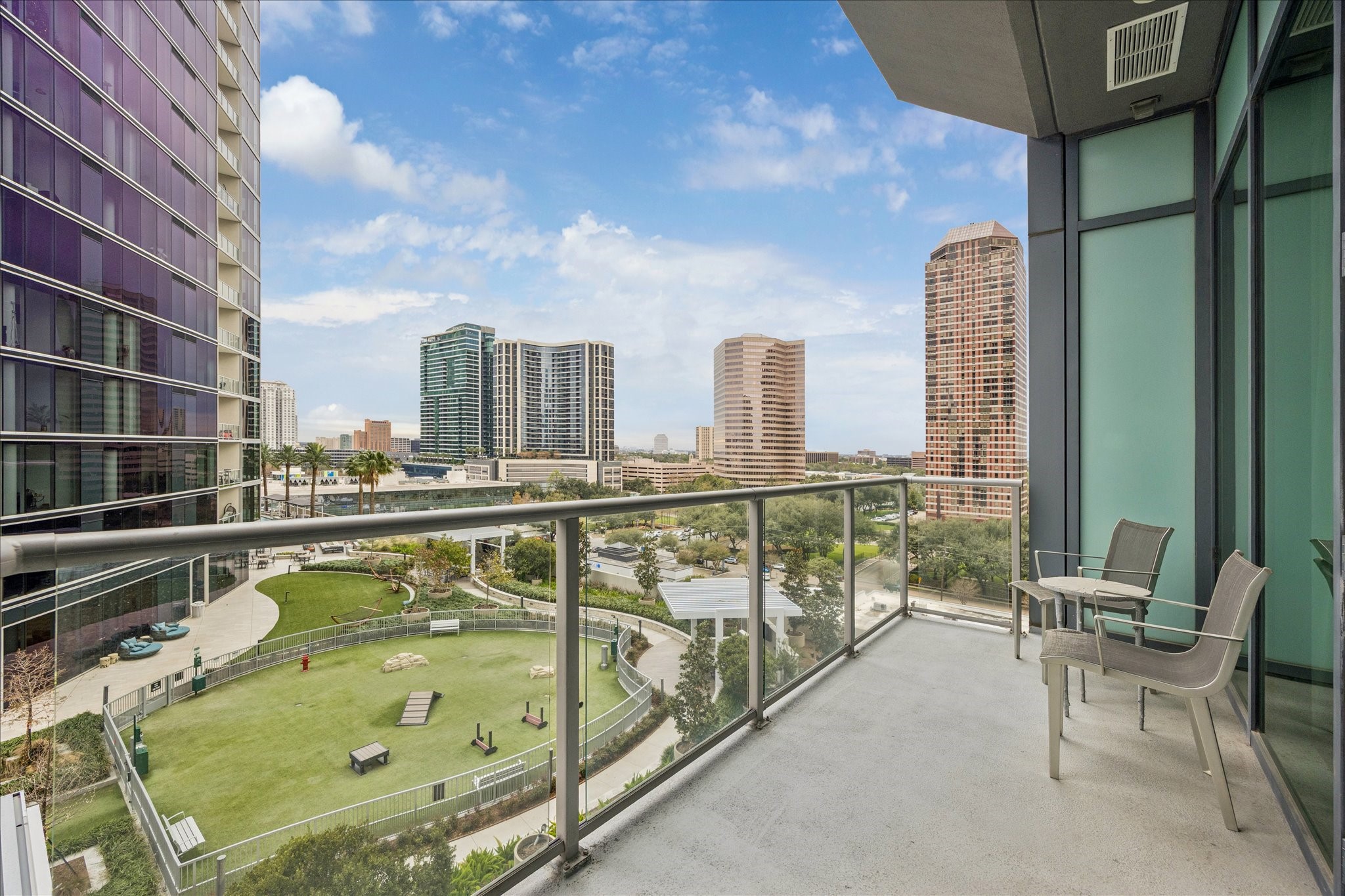 1600 Post Oak Boulevard, Unit 1007 Houston, TX 77056 - Photo 2 of 14 a view of balcony with furniture