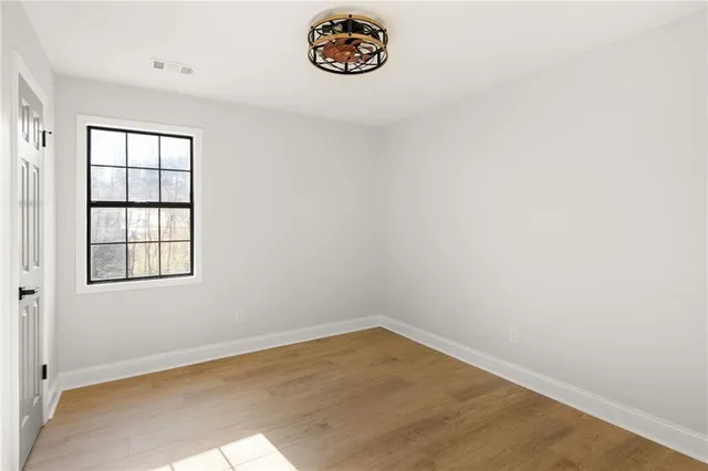 an empty room with windows