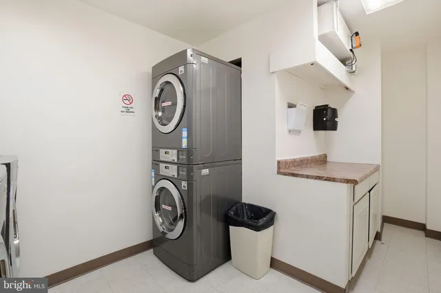 a bathroom with a toilet and a sink