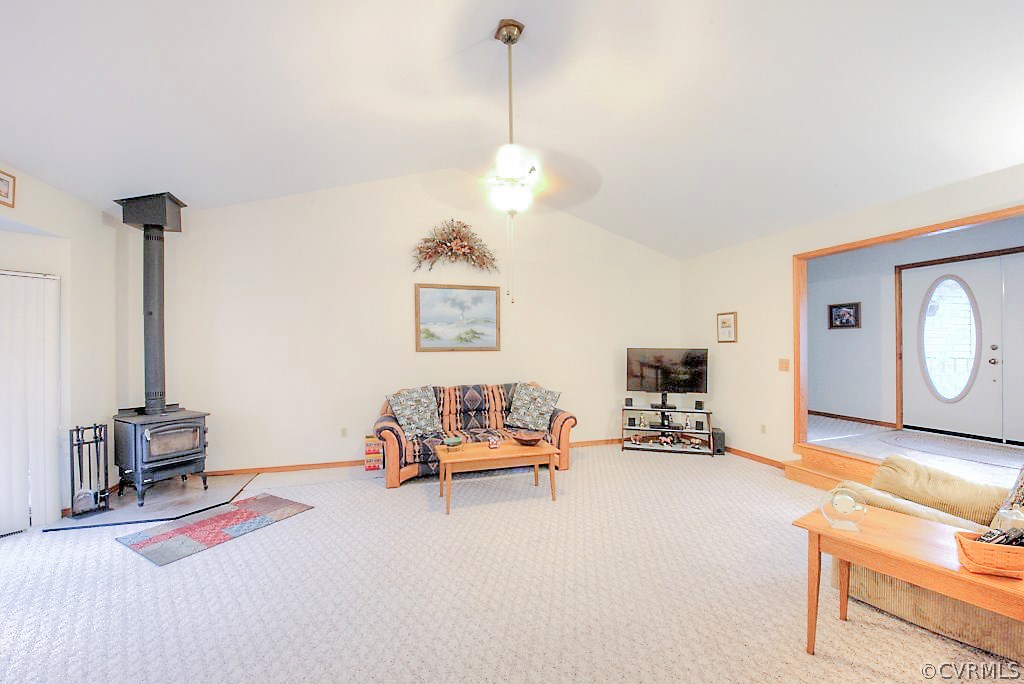 2923 Ashdale Road Center Cross, VA 22437 - Photo 5 of 45 Vaulted family room has carpet, fan/fixture, wood
