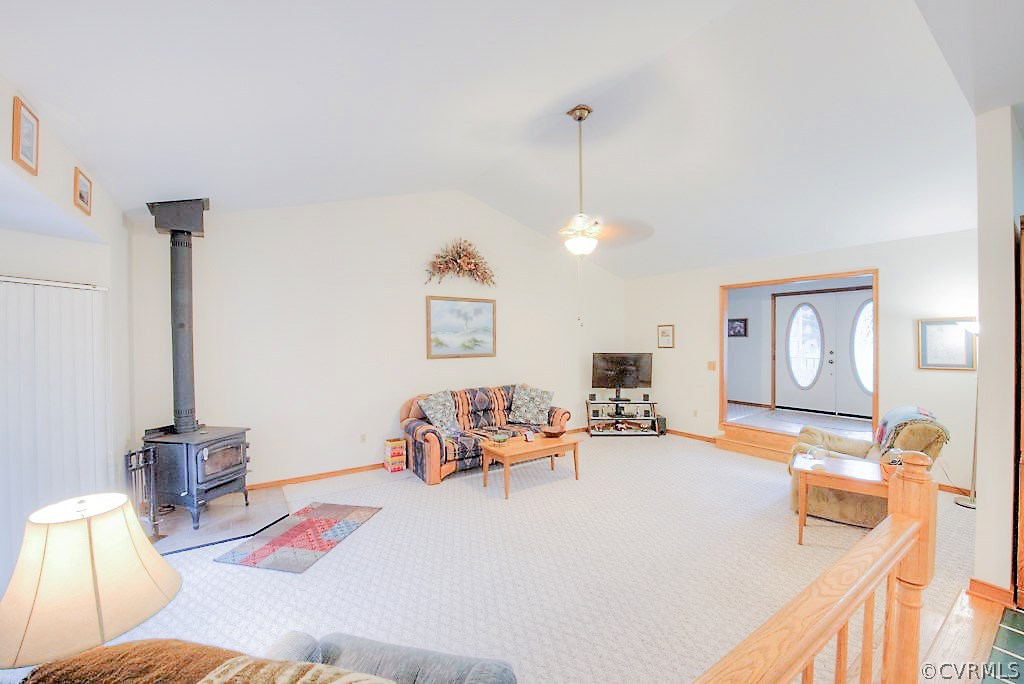 2923 Ashdale Road Center Cross, VA 22437 - Photo 6 of 45 Vaulted family room has carpet, fan/fixture, wood