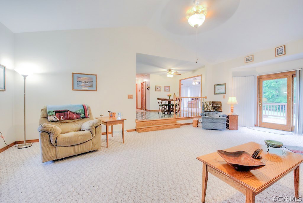 2923 Ashdale Road Center Cross, VA 22437 - Photo 7 of 45 Vaulted family room has carpet, fan/fixture, wood