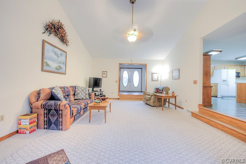 2923 Ashdale Road Center Cross, VA 22437 - Photo 8 of 45 Vaulted family room has carpet, fan/fixture, wood