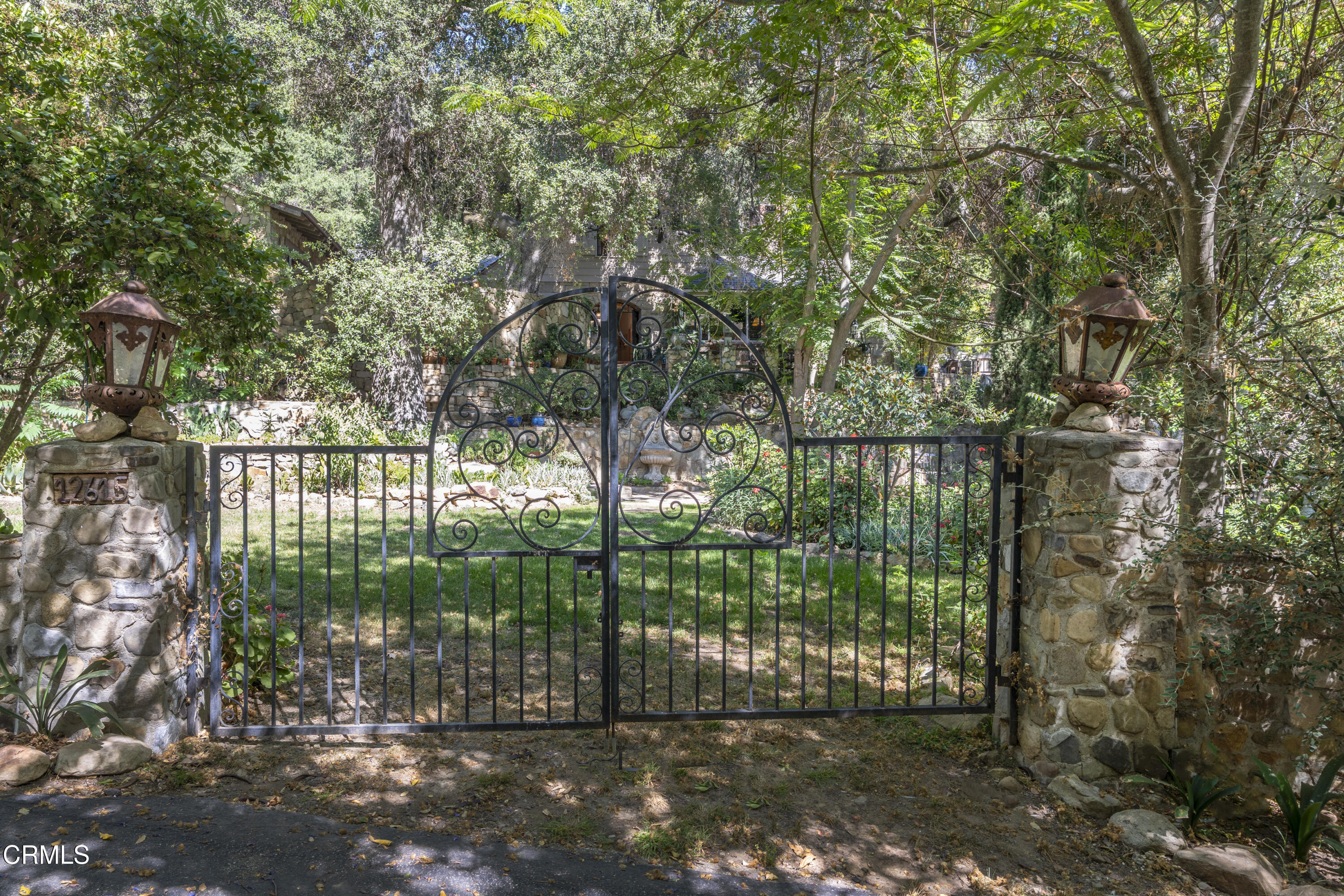 12615 Koenigstein Road Santa Paula, CA 93060 - Photo 35 of 41 a view of a yard with a tree