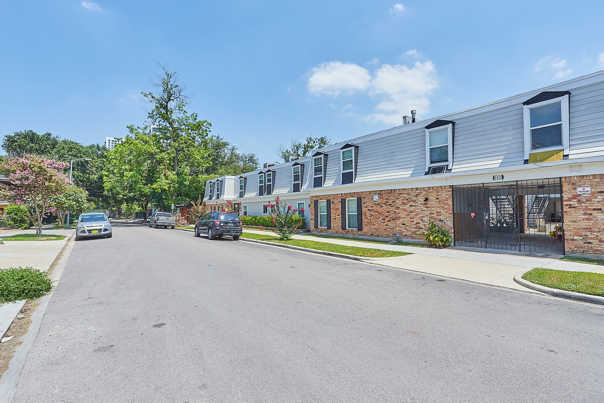 1419 Hawthorne Street, Unit 9 Houston, TX 77006 - Photo 1 of 24 a view of a swimming pool with a patio