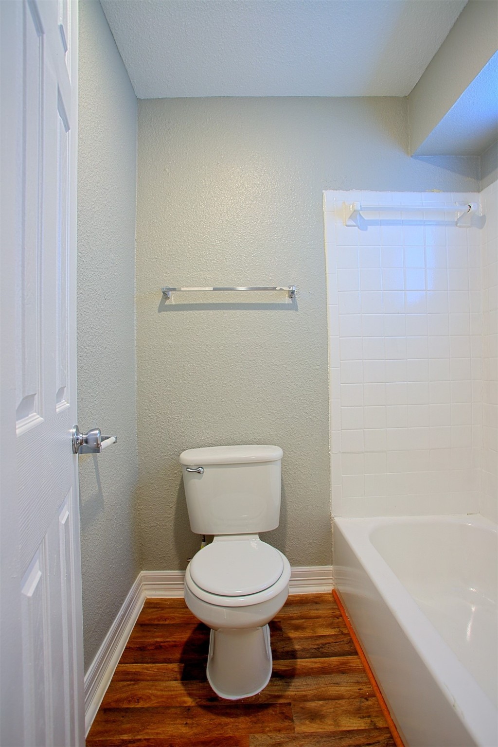 1419 Hawthorne Street, Unit 9 Houston, TX 77006 - Photo 9 of 24 a bathroom with a toilet and a shower