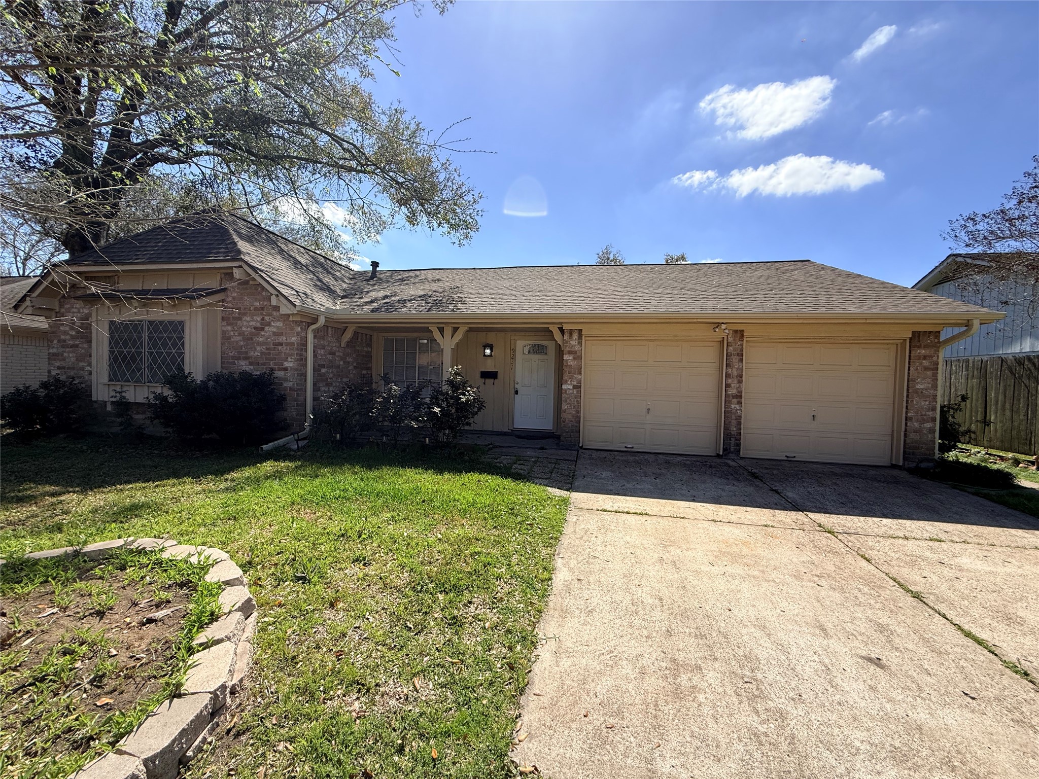 9231 Friendship Road Houston, TX 77080 - Photo 1 of 12 a view of a house with a yard