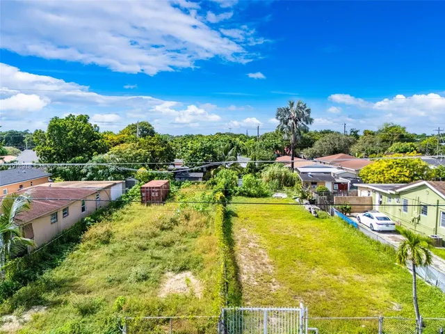 a view of a swimming pool with a lake view