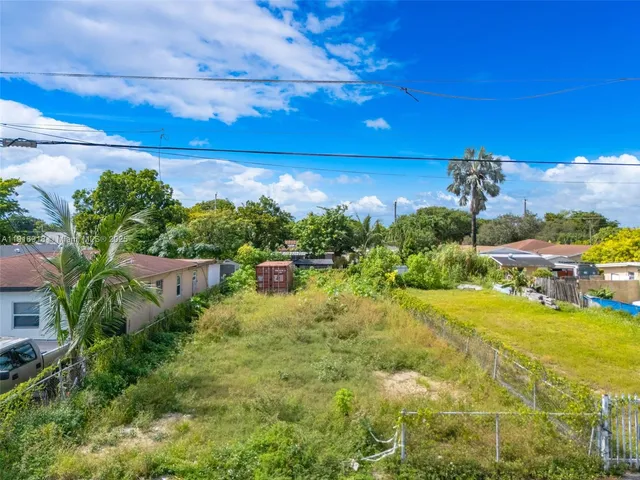 a view of a yard with an outdoor space