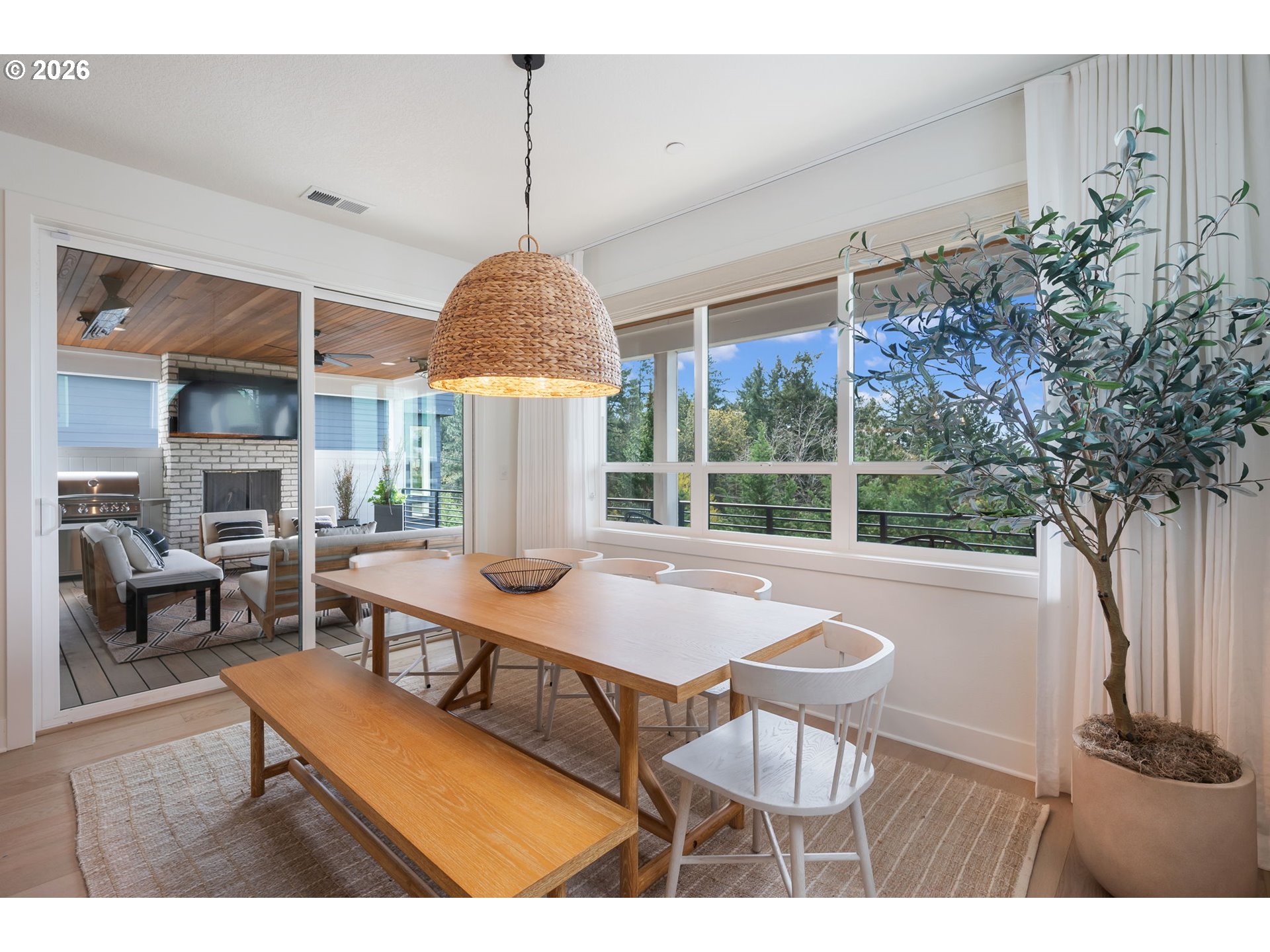 3724 Southwest Hillside Drive Portland, OR 97221 - Photo 15 of 48 a dining room with furniture a chandelier and window