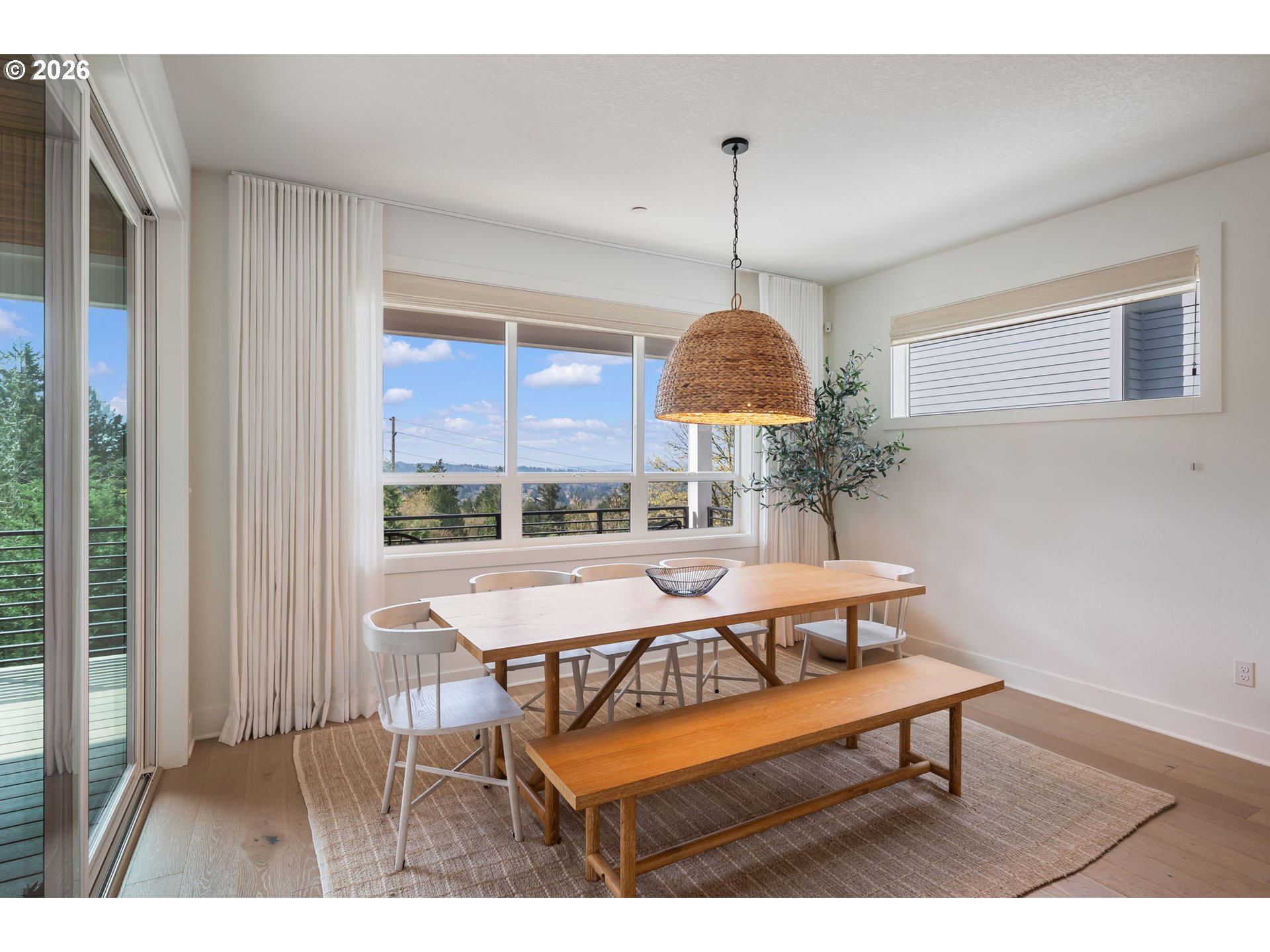 3724 Southwest Hillside Drive Portland, OR 97221 - Photo 16 of 48 a view of a dining room with furniture window and outside view
