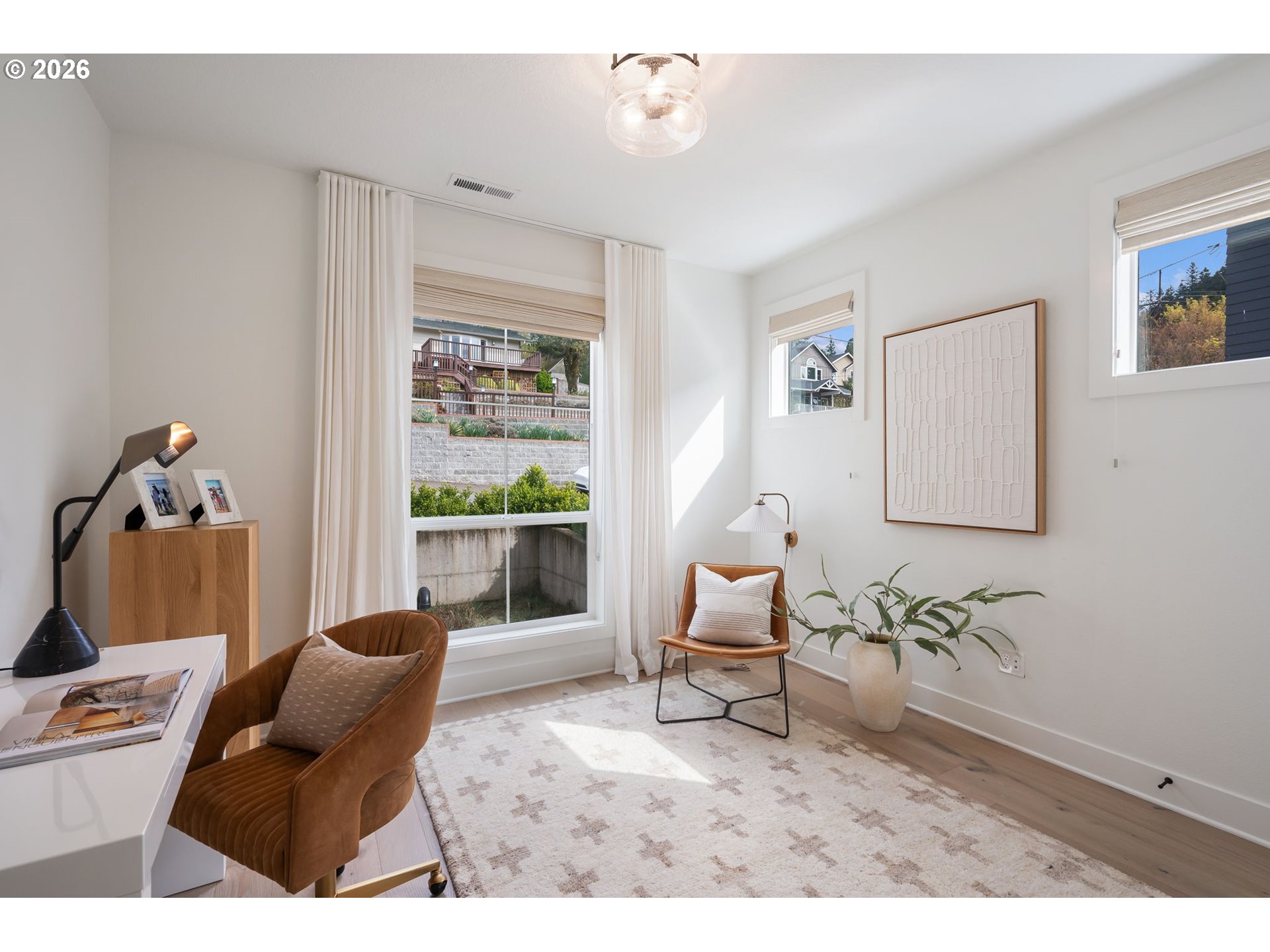 3724 Southwest Hillside Drive Portland, OR 97221 - Photo 19 of 48 a living room with furniture and a window
