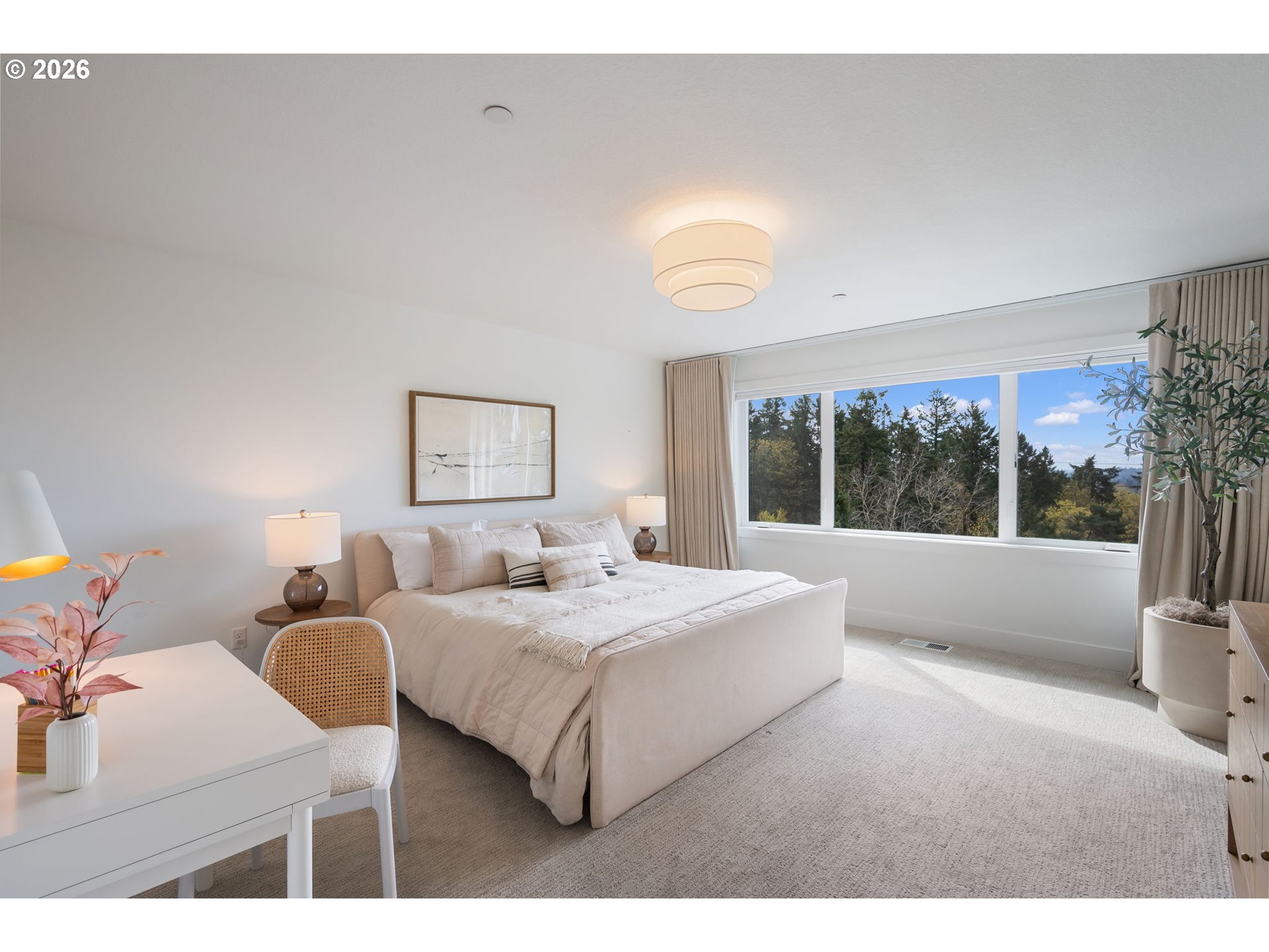 3724 Southwest Hillside Drive Portland, OR 97221 - Photo 21 of 48 a bedroom with a bed and a large window
