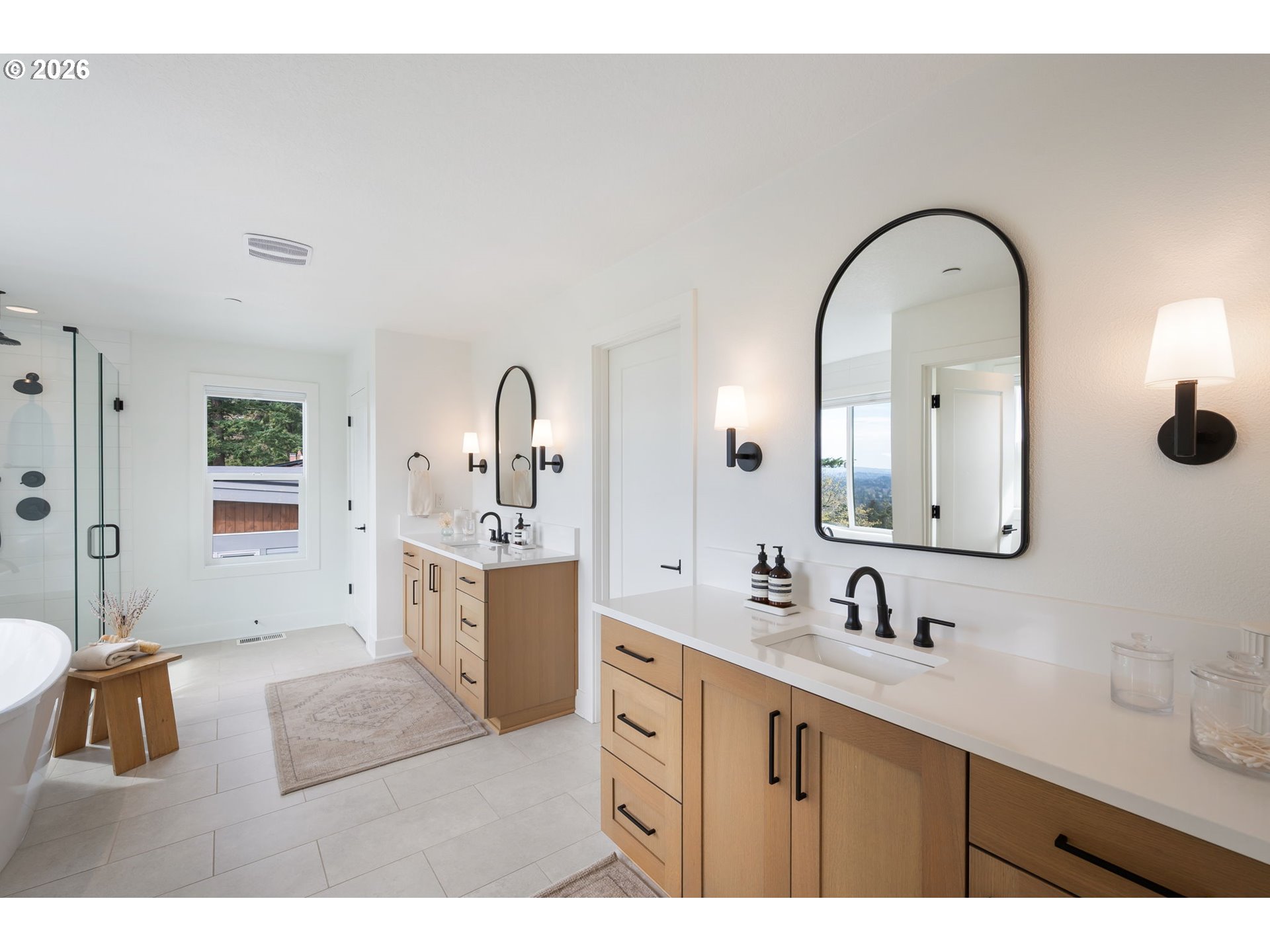 3724 Southwest Hillside Drive Portland, OR 97221 - Photo 24 of 48 a spacious bathroom with a double vanity sink a mirror and shower