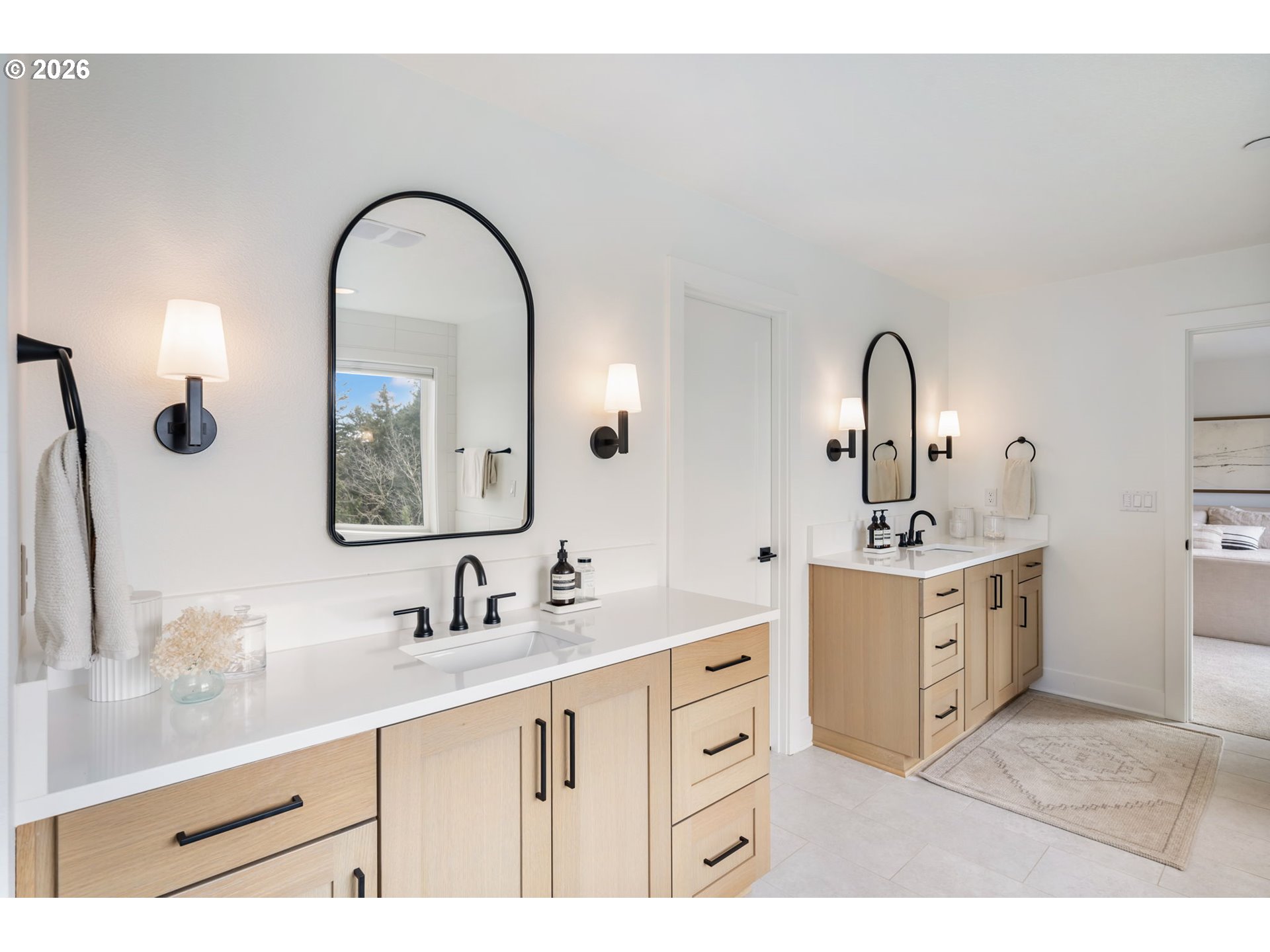 3724 Southwest Hillside Drive Portland, OR 97221 - Photo 25 of 48 a spacious bathroom with a double vanity sink and a mirror