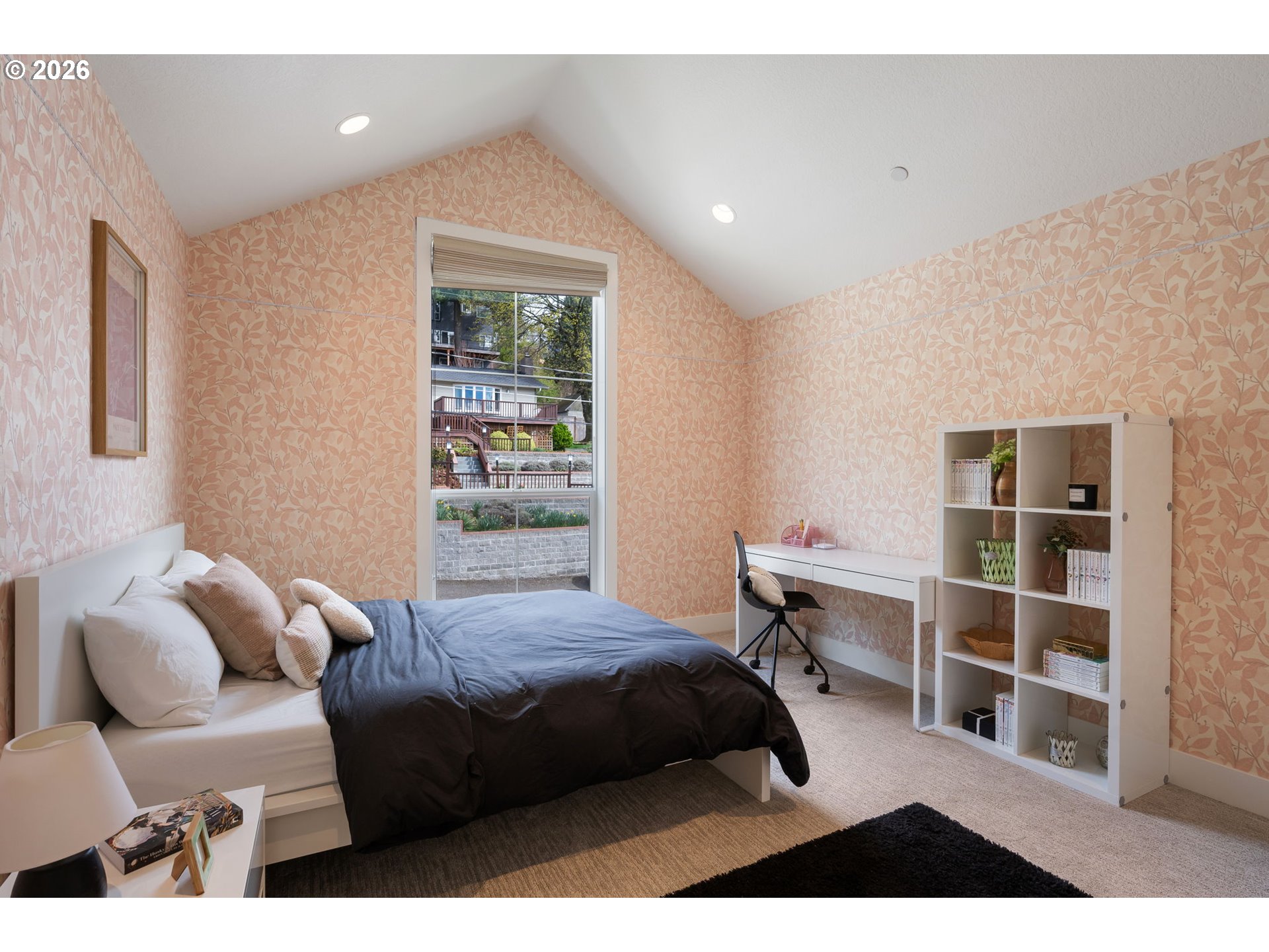 3724 Southwest Hillside Drive Portland, OR 97221 - Photo 27 of 48 a bedroom with a bed and a window