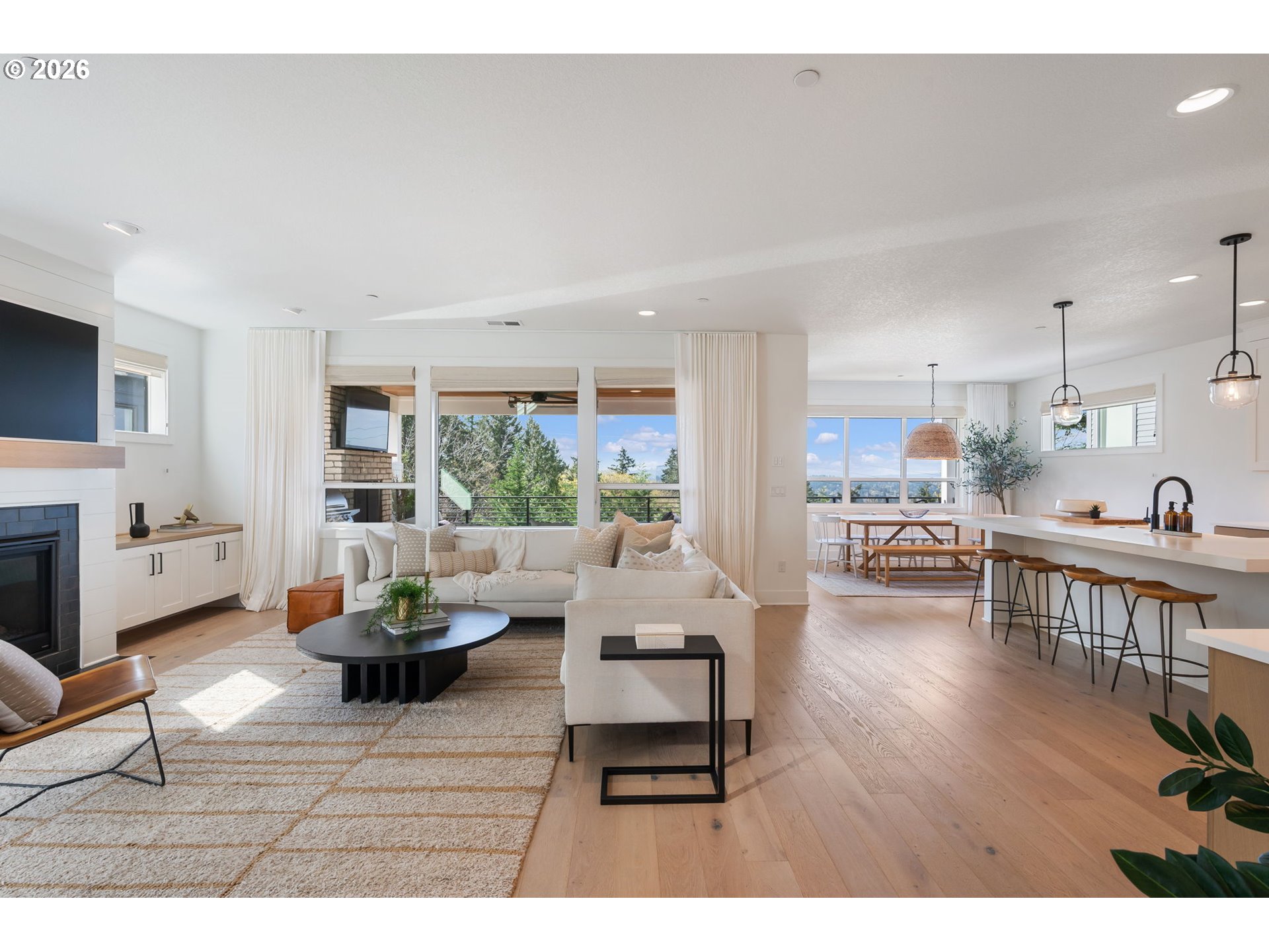 3724 Southwest Hillside Drive Portland, OR 97221 - Photo 3 of 48 a living room with furniture and a wooden floor