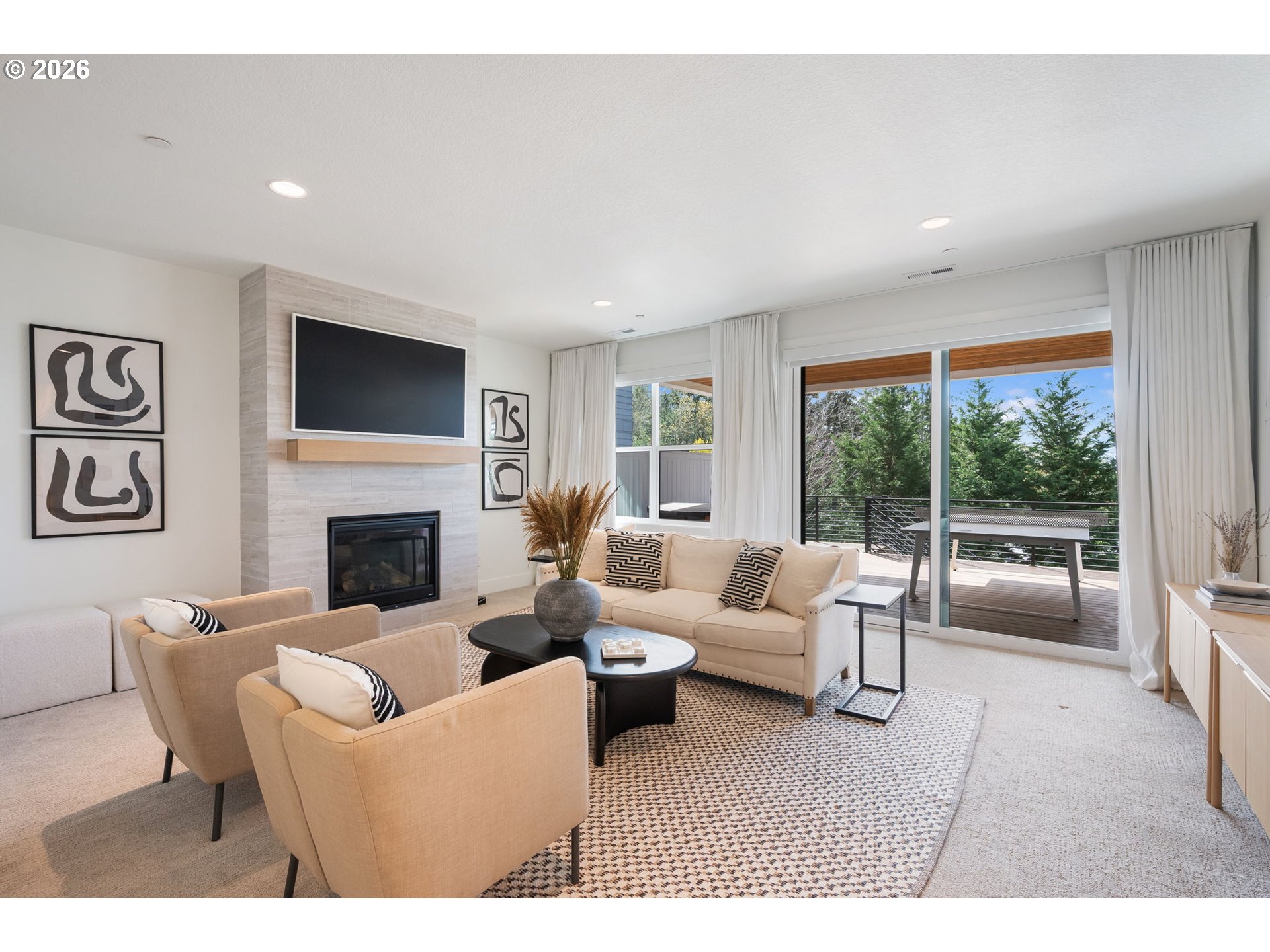 3724 Southwest Hillside Drive Portland, OR 97221 - Photo 32 of 48 a living room with furniture and a fireplace