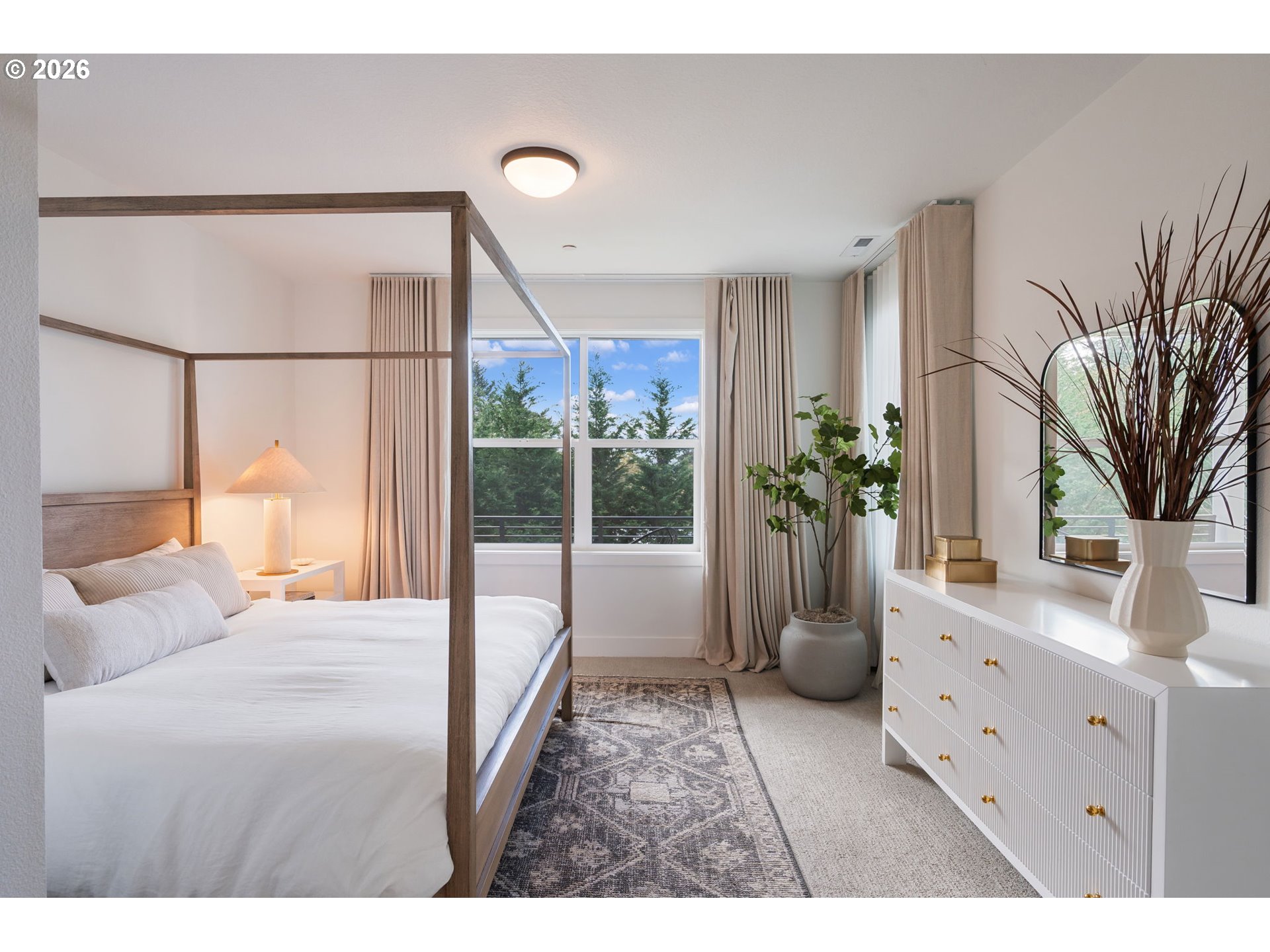 3724 Southwest Hillside Drive Portland, OR 97221 - Photo 35 of 48 a bedroom with furniture and a potted plant