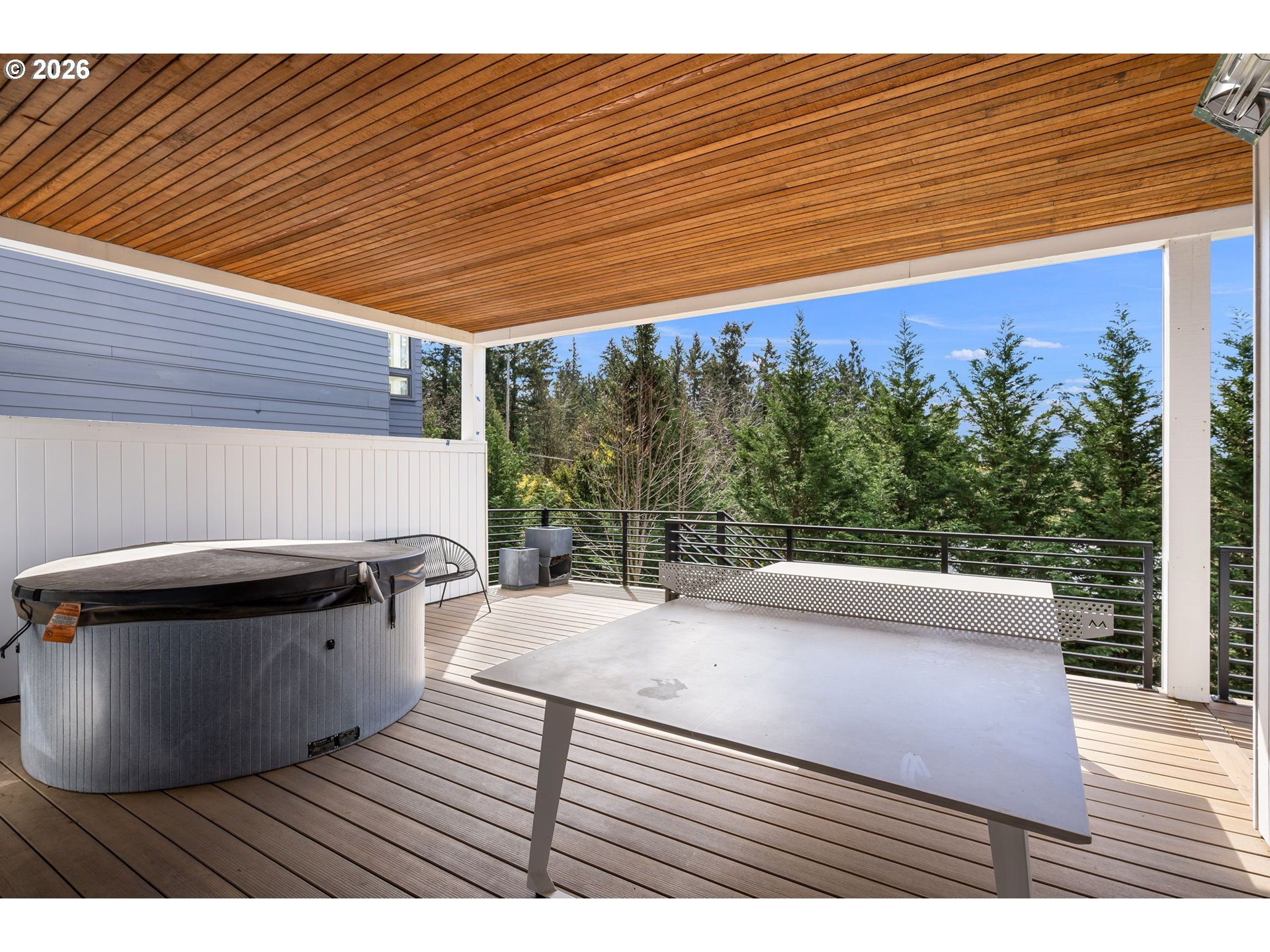 3724 Southwest Hillside Drive Portland, OR 97221 - Photo 37 of 48 a view of a backyard with plants and outdoor seating