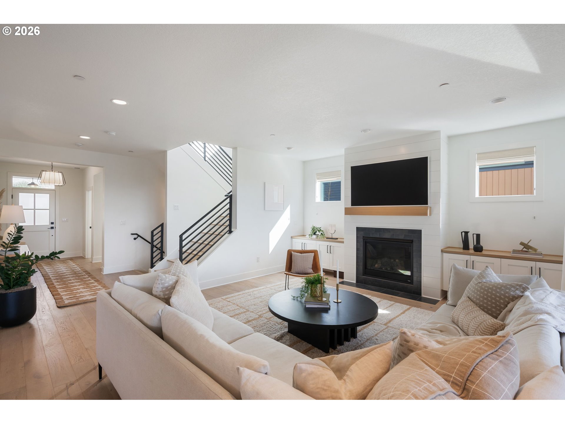 3724 Southwest Hillside Drive Portland, OR 97221 - Photo 6 of 48 a living room with furniture and a fireplace