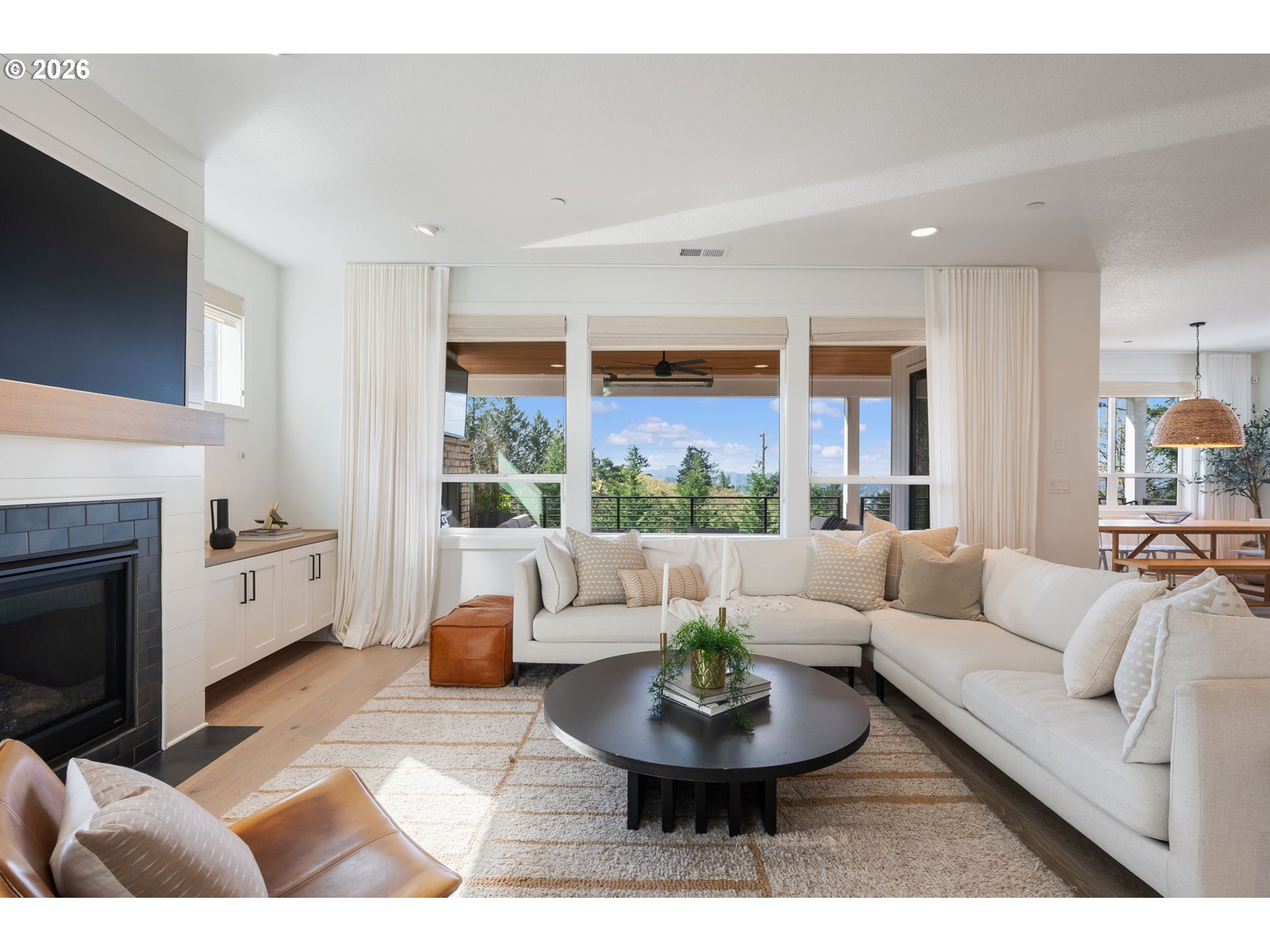 3724 Southwest Hillside Drive Portland, OR 97221 - Photo 7 of 48 a living room with furniture and a fireplace