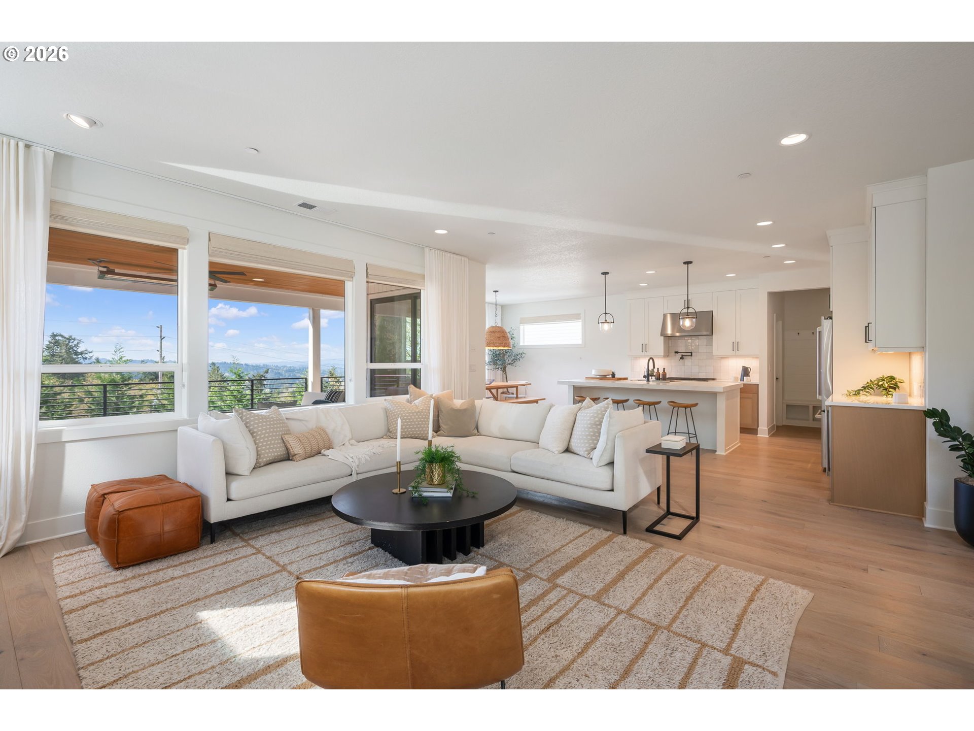 3724 Southwest Hillside Drive Portland, OR 97221 - Photo 8 of 48 a living room with furniture and a large window