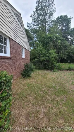a view of backyard of house