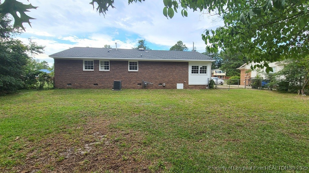 5326 Hampton Road Fayetteville, NC 28311 - Photo 17 of 17 a backyard of a house with table and chairs