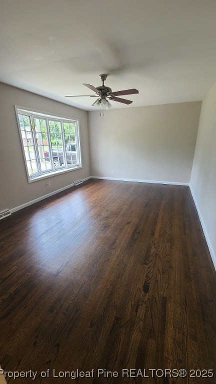 5326 Hampton Road Fayetteville, NC 28311 - Photo 3 of 17 an empty room with wooden floor fan and windows