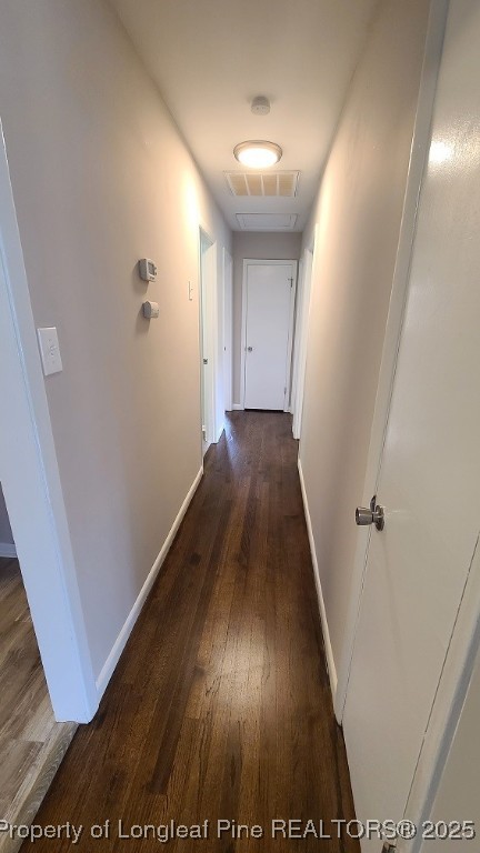 5326 Hampton Road Fayetteville, NC 28311 - Photo 4 of 17 a view of a hallway with wooden floor