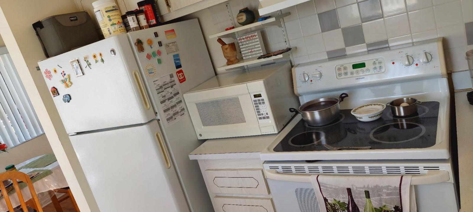 3100 Springdale Boulevard, Unit 317 Palm Springs, FL 33461 - Photo 17 of 18 a utility room with dryer and washer