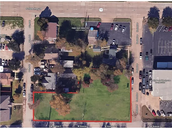 an aerial view of houses with outdoor space