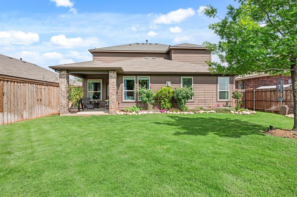 15817 White Mill Road Fort Worth, TX 76177 - Photo 26 of 27 a front view of a house with a garden