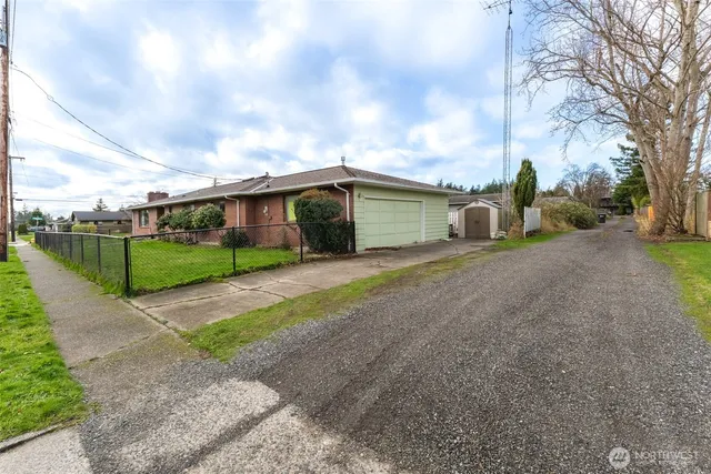 a yellow house with a outdoor space