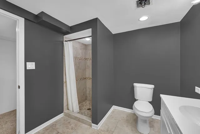 a view of a deck with a yard