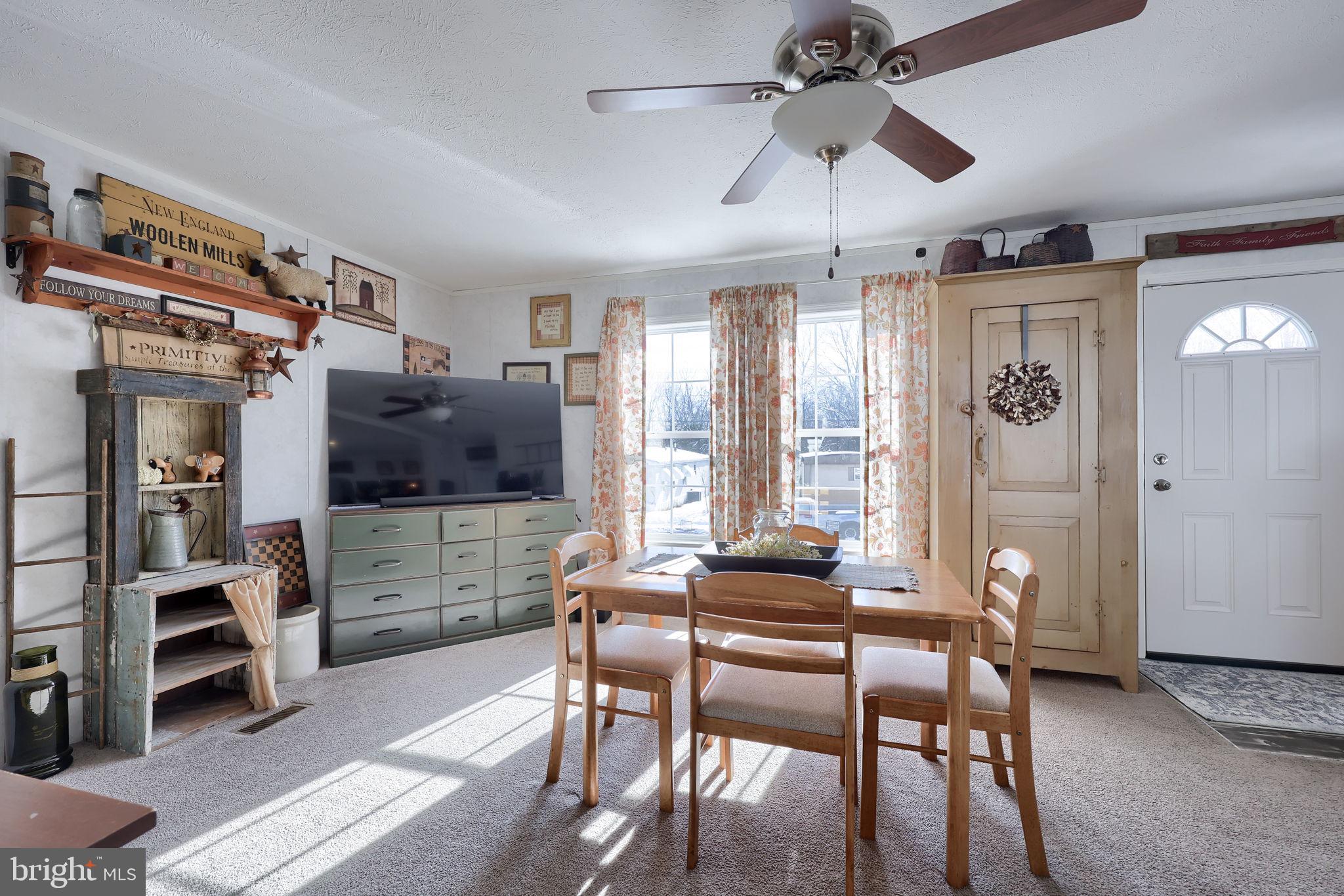 1395 Bowmansville Road Mohnton, PA 19540 - Photo 12 of 26 a view of a livingroom with furniture and a window