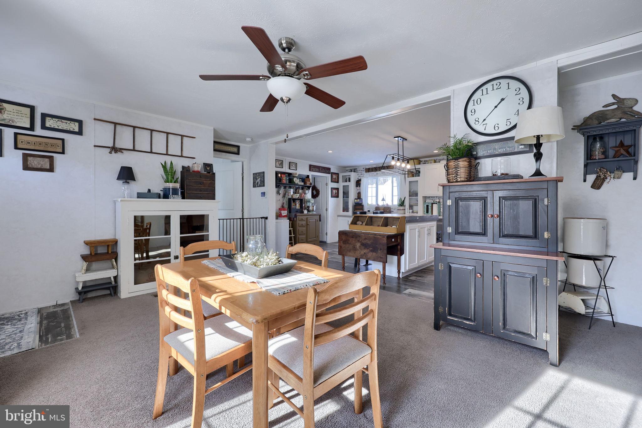1395 Bowmansville Road Mohnton, PA 19540 - Photo 13 of 26 a view of a dining room kitchen with furniture and a clock