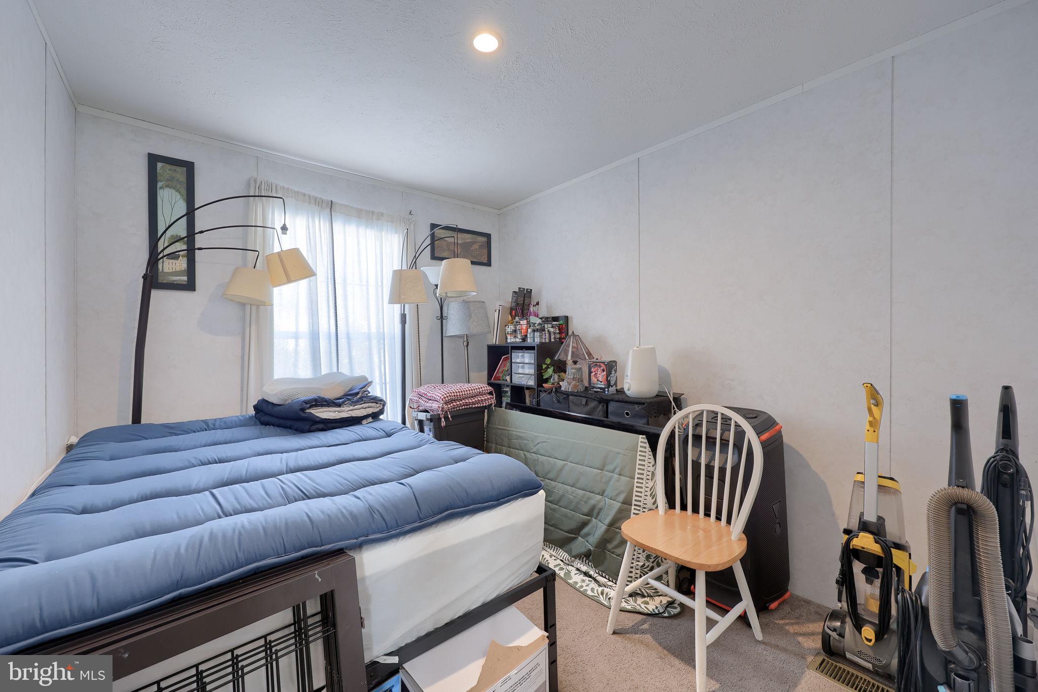 1395 Bowmansville Road Mohnton, PA 19540 - Photo 24 of 26 a bedroom with furniture and a window