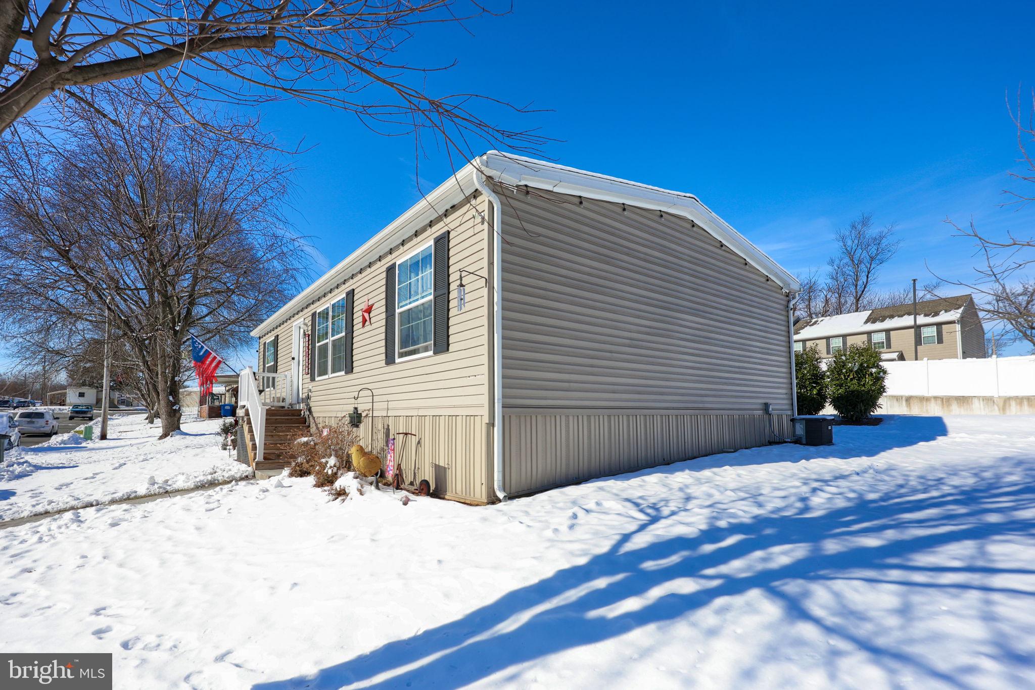 1395 Bowmansville Road Mohnton, PA 19540 - Photo 3 of 26 a front view of a house with a yard