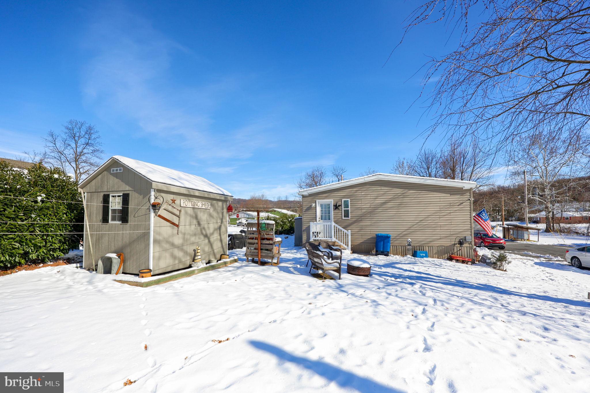 1395 Bowmansville Road Mohnton, PA 19540 - Photo 8 of 26 a view of a car park in front of house